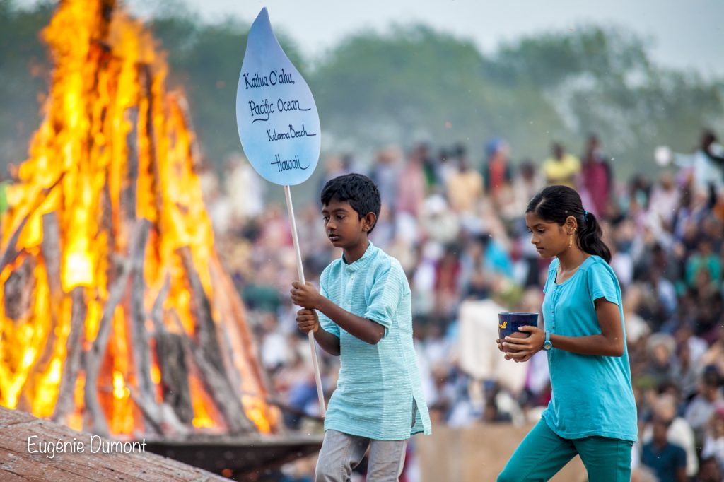 Children with water at Auroville 50th celebration